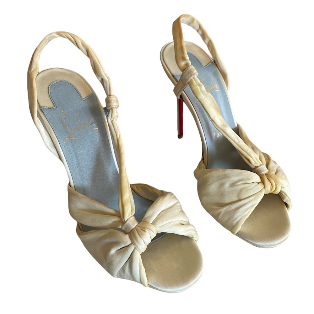 Christian Louboutin Cream Knotted Slingback Heels with Signature Red Sole